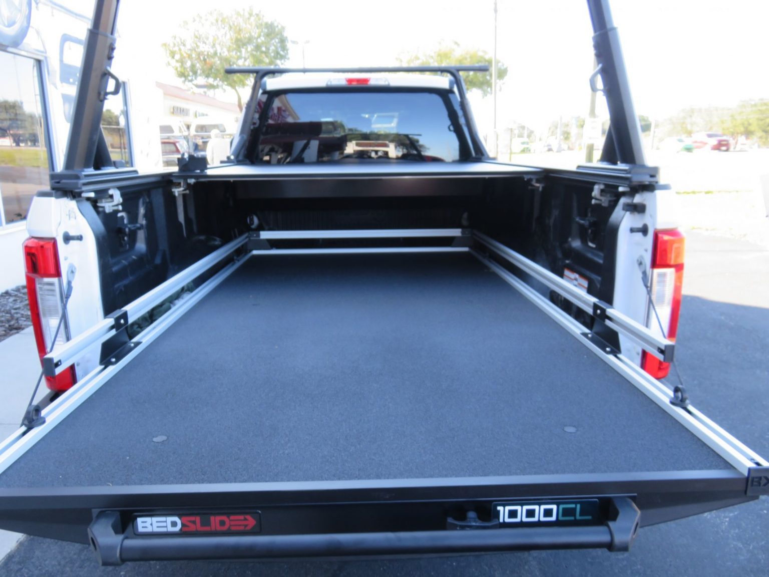 Ford F250 Work Truck with Retrax Yakima BedSlide TopperKING