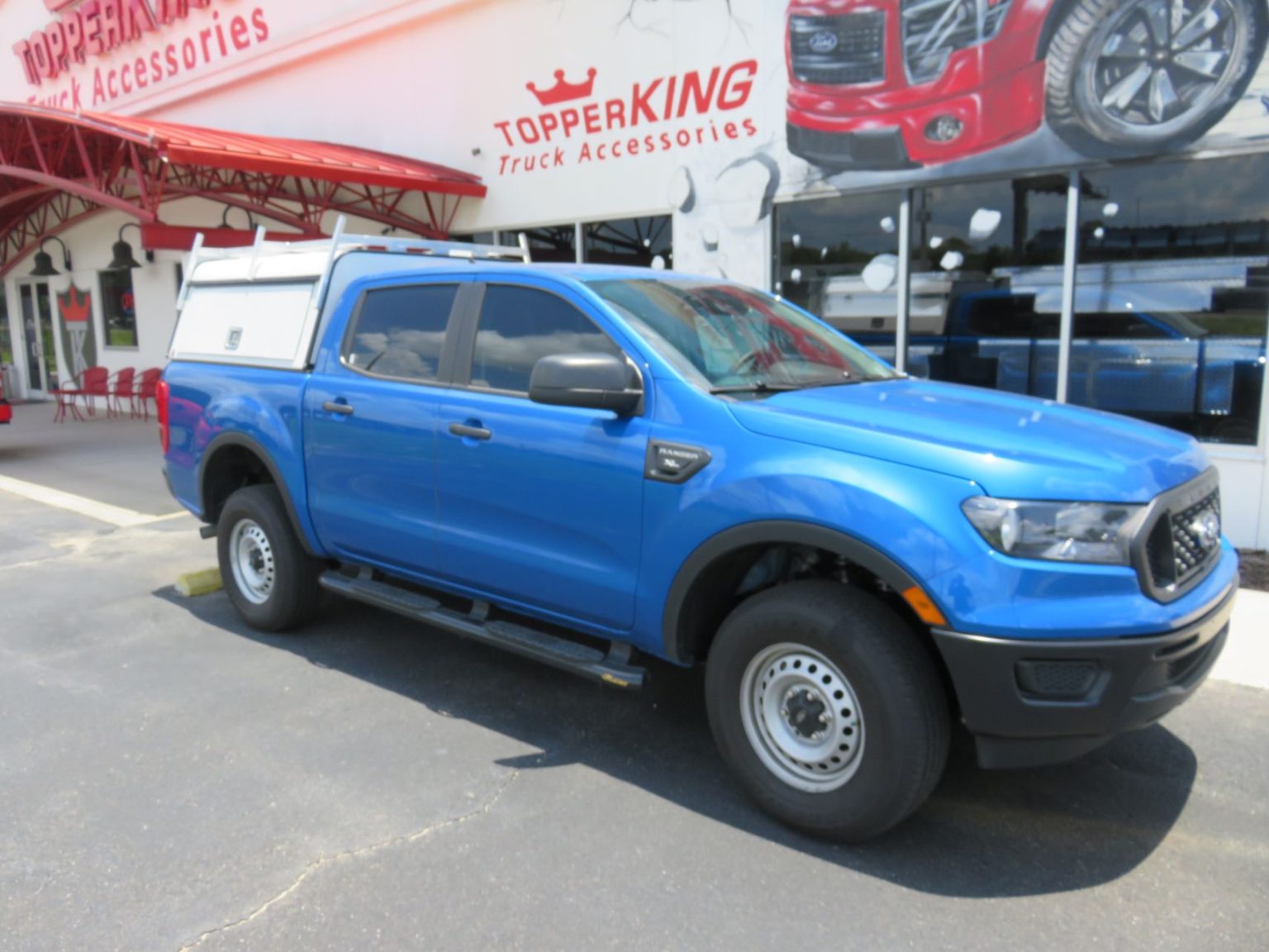 2022 blue Ford Ranger with LEER DCC construction topper TopperKING